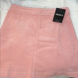 Light pink corduroy mini skirt